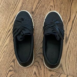 Black faux leather slip on sneakers